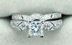 White gold princess cut diamond engagement ring with matching wedding
band 